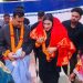 মাহিকে লাল শাড়ি ও স্বামীকে ধুতিতে দিয়ে বরণ